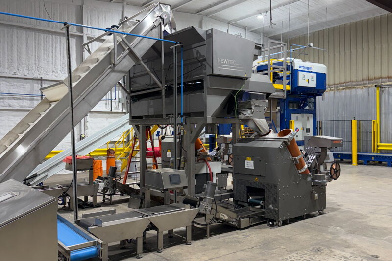 Automated consumer onion packaging equipment at The Onion House